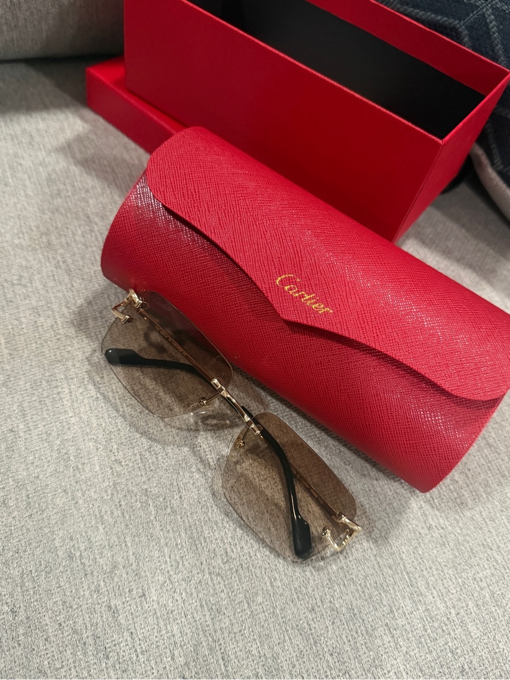 Cartier Gold Rimless Sunglasses with Brown Gradient Lenses and Red Case